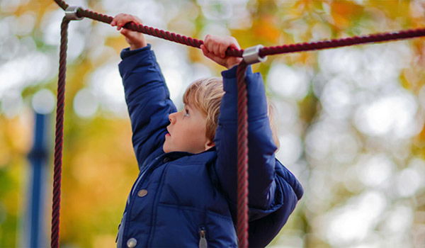Boy on Jungle Gym