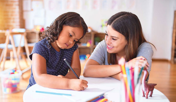 Child and teacher